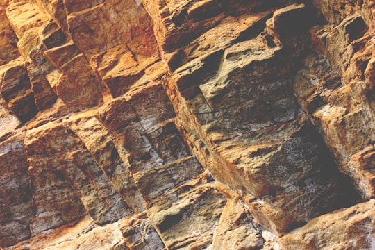 brown rock formations at daytime in Groix France