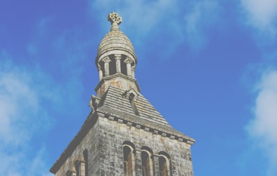 low angle view photography of brown stone cathedral