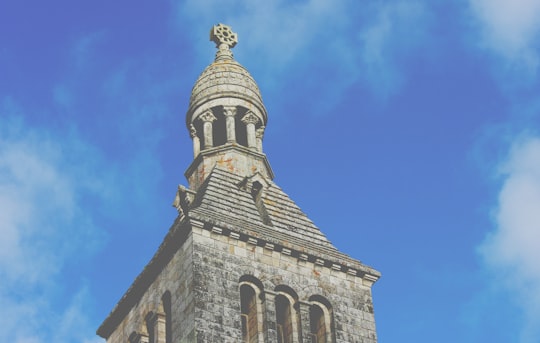 low angle view photography of brown stone cathedral in Pont-Aven France