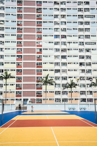 white wall paint high-rise building during daytime