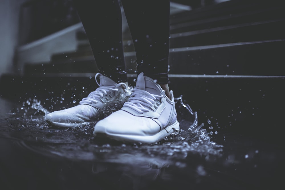 person wearing pair of cream white Adidas Yeezy Boost 350 shoes photo –  Free Image on Unsplash