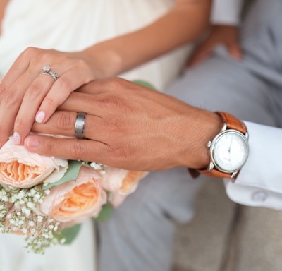 man and woman holding hands