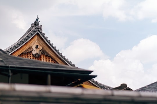 architectural photography of brown temple in Arashiyama Japan