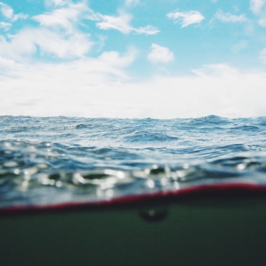 body of water under cloudy sky in Tamarindo Costa Rica