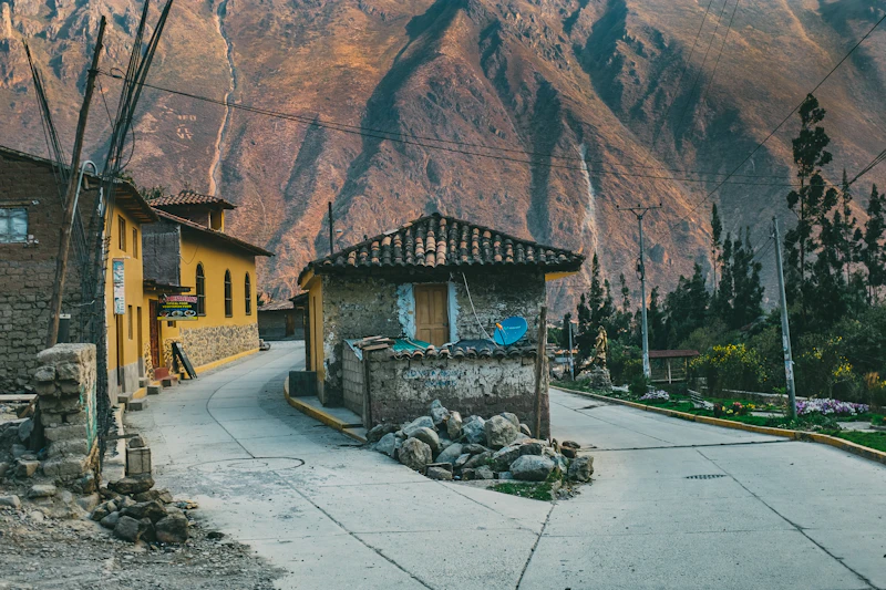 A cobbled street and Inca walls in the town of Ollantaytambo