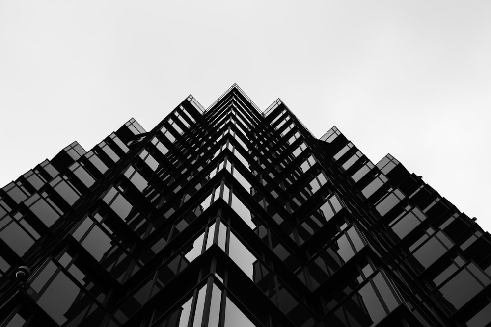 glass building under white sky during daytime