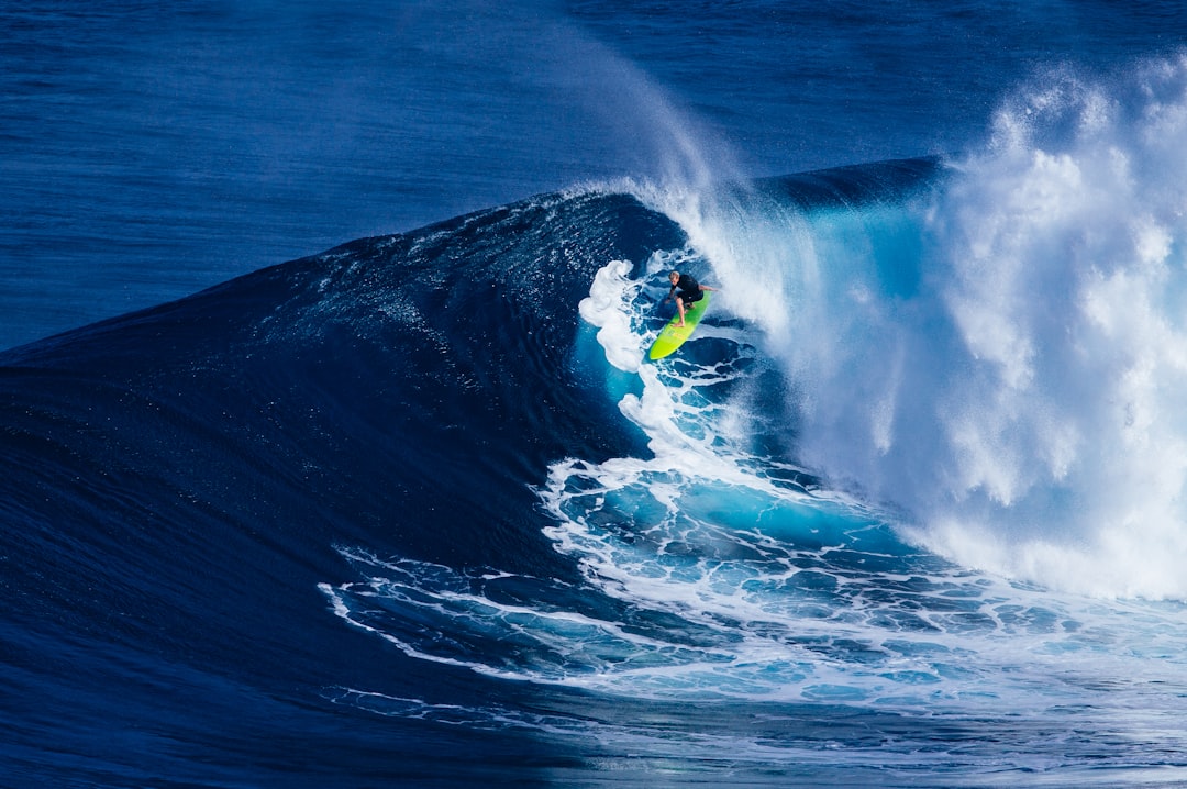 person doing surfing on wave