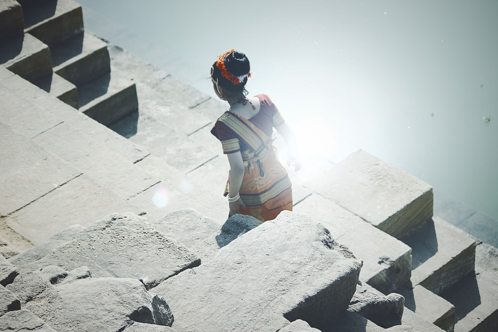 woman standing on concrete platform