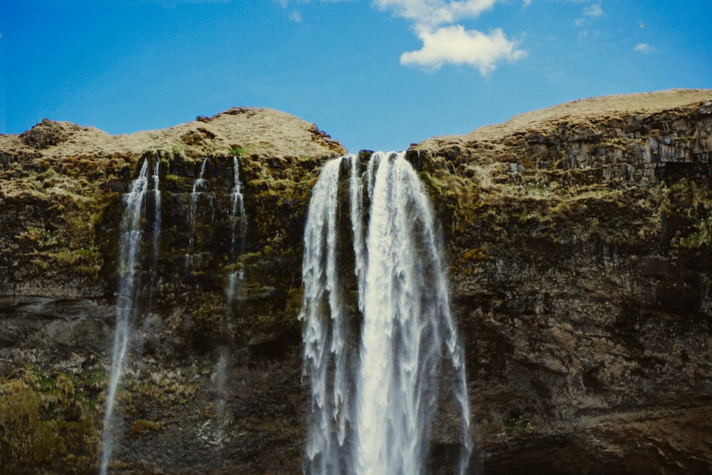 landscape photography of waterfalls