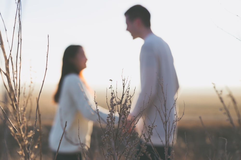 man wearing white crew-neck sweater