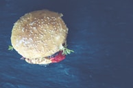 Close-up of a perfectly toasted hamburger bun with sesame seeds