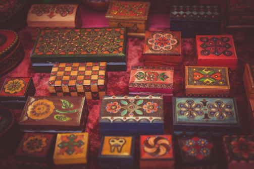 A collection of delicate Islamic gift boxes adorned with traditional patterns.