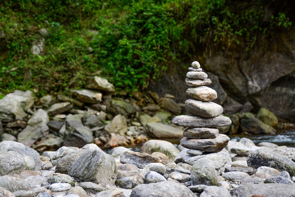 shallow focus photography balance stones