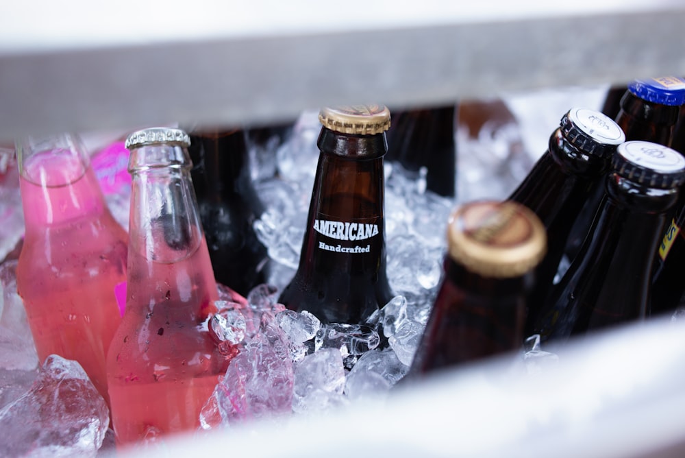 clear labeled bottles in cooler box