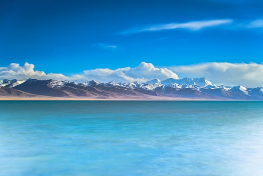 mountain near on body of water photography in Nam Co China