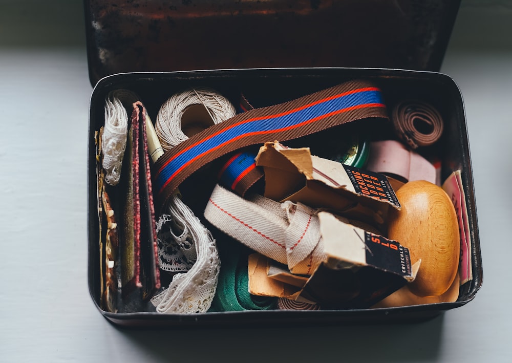 assorted belts and packs on metal case
