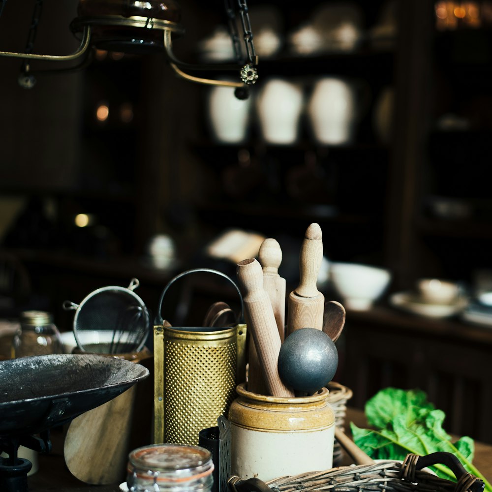 three brown wooden rolling pins