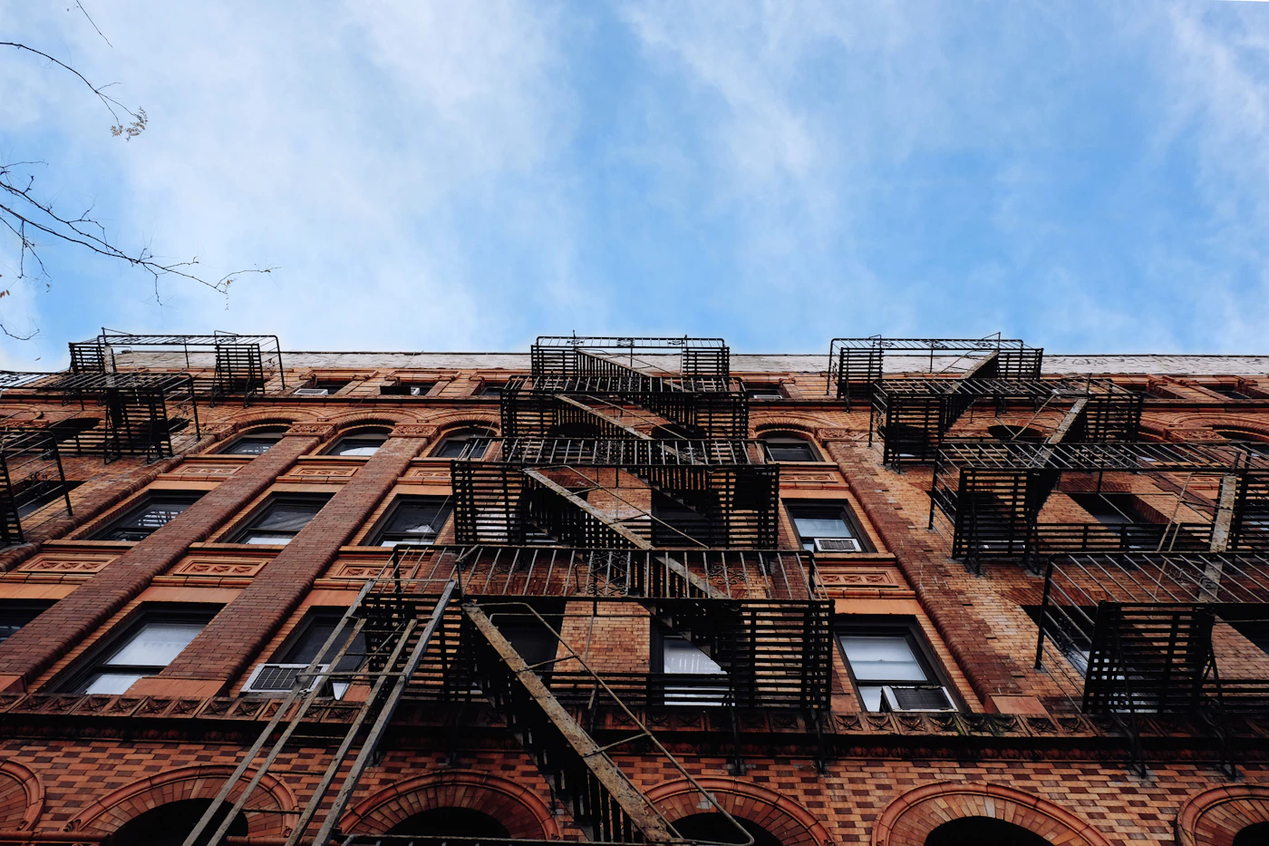 Low-angle view of an older apartment building