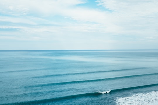 photo og calm body of water in Mahia New Zealand