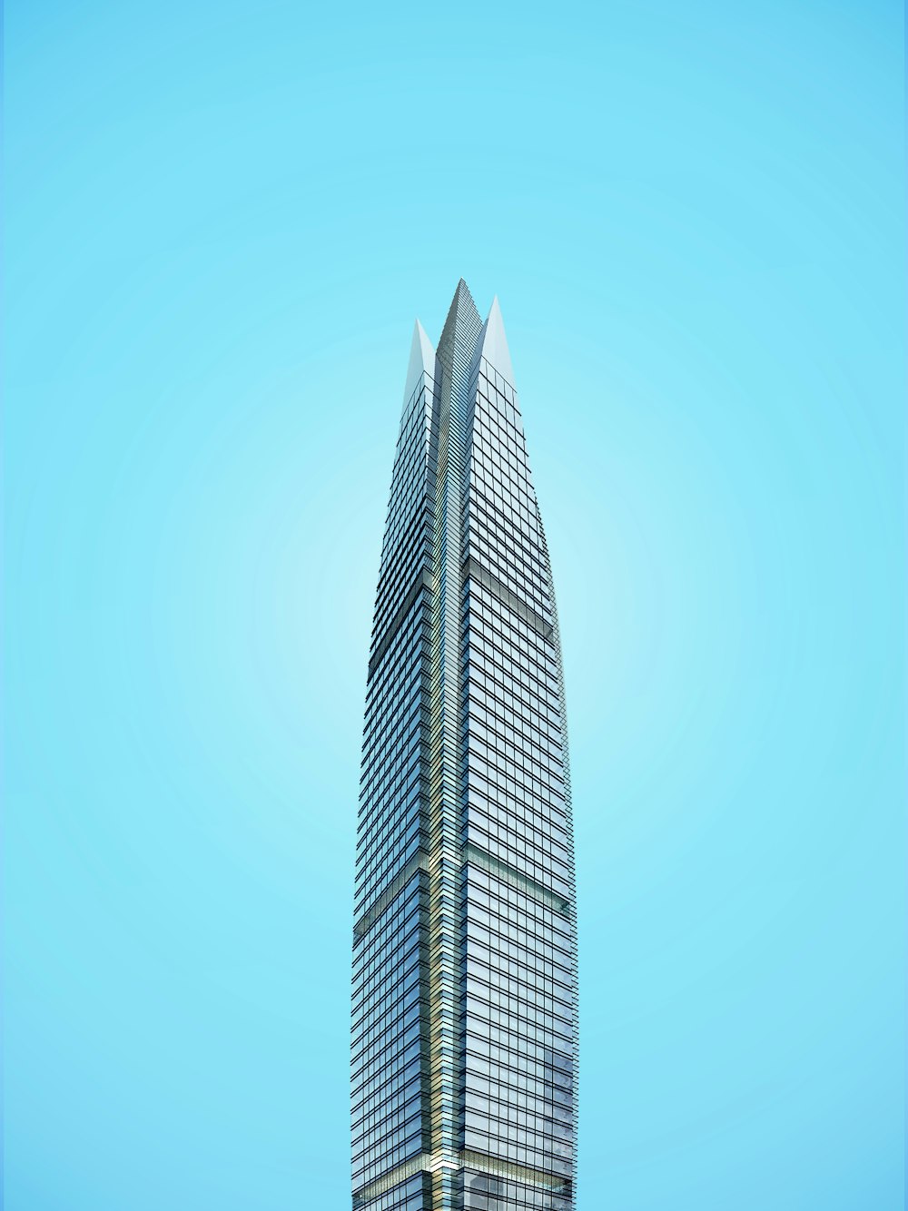 gray high-rise building under blue sky