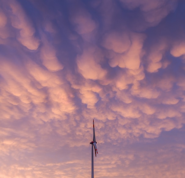 white clouds over the wind turbines