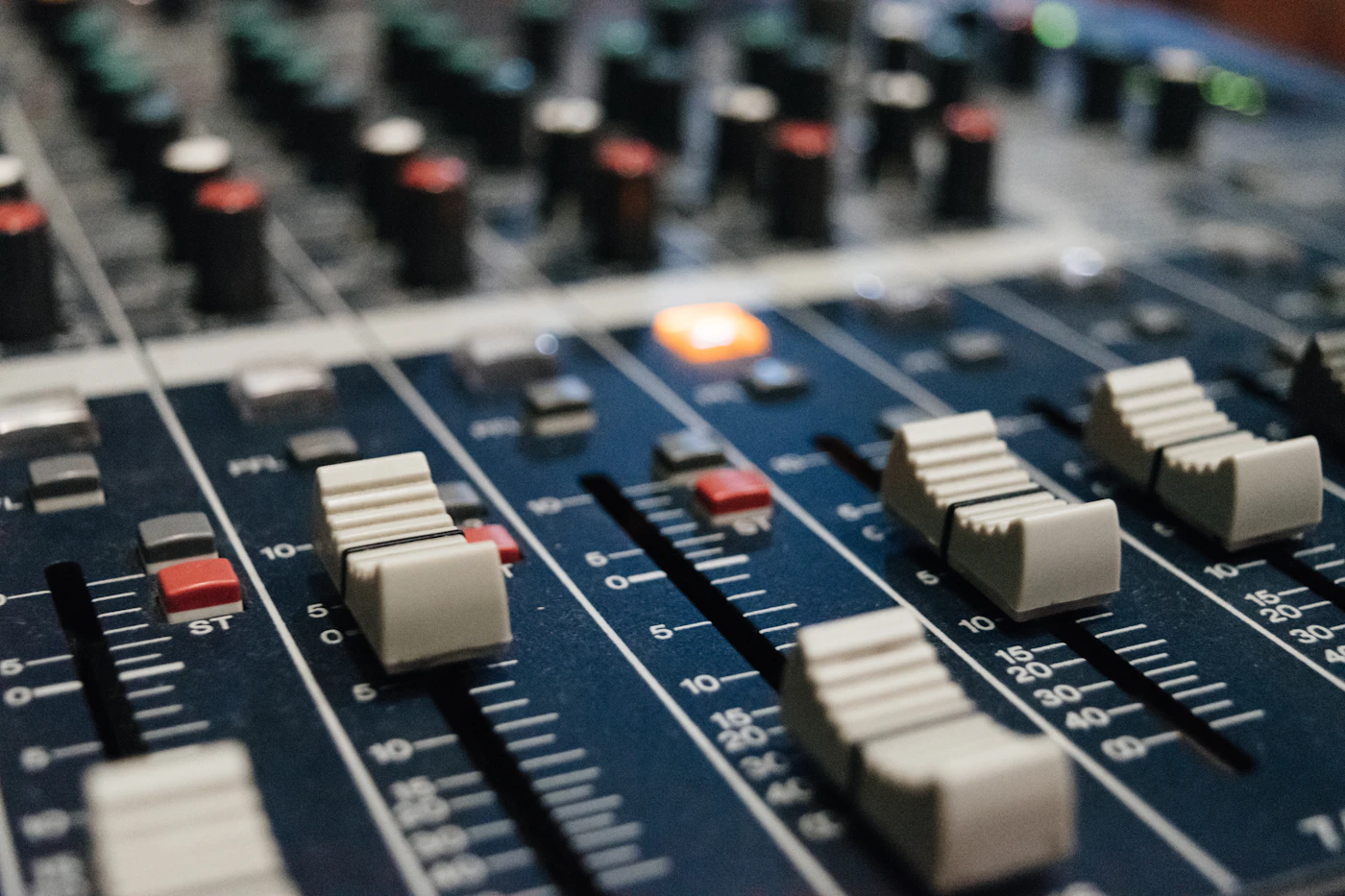 Mixing desk faders and studio gear