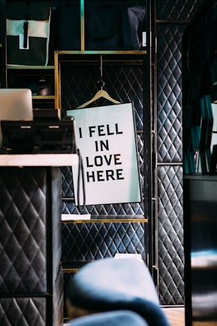 i fell in love here poster in a room