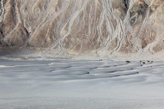 body of water beside mountain in Nubra Valley India