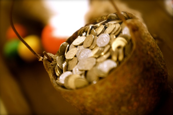 A vibrant image showcasing a piggy bank filled with coins.