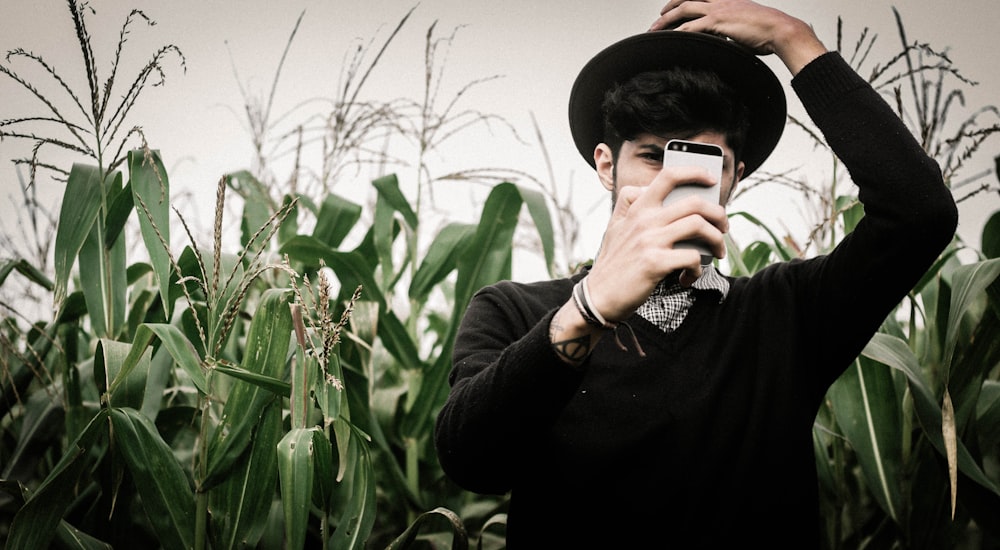 men wearing black hat close-up photography