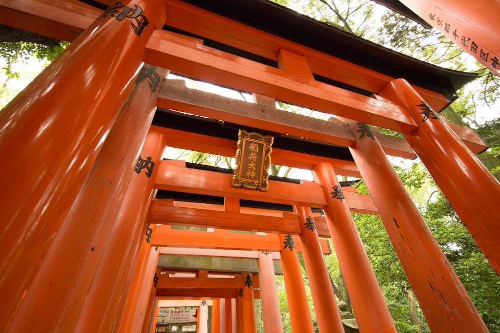 red and black wooden tori