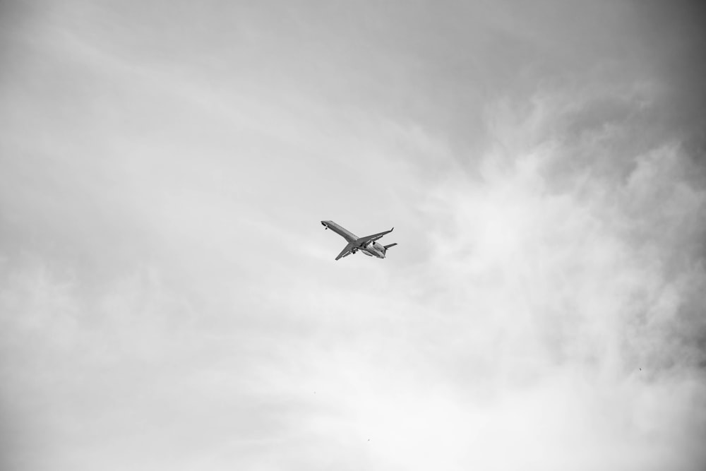 Grayscale photo of airplane