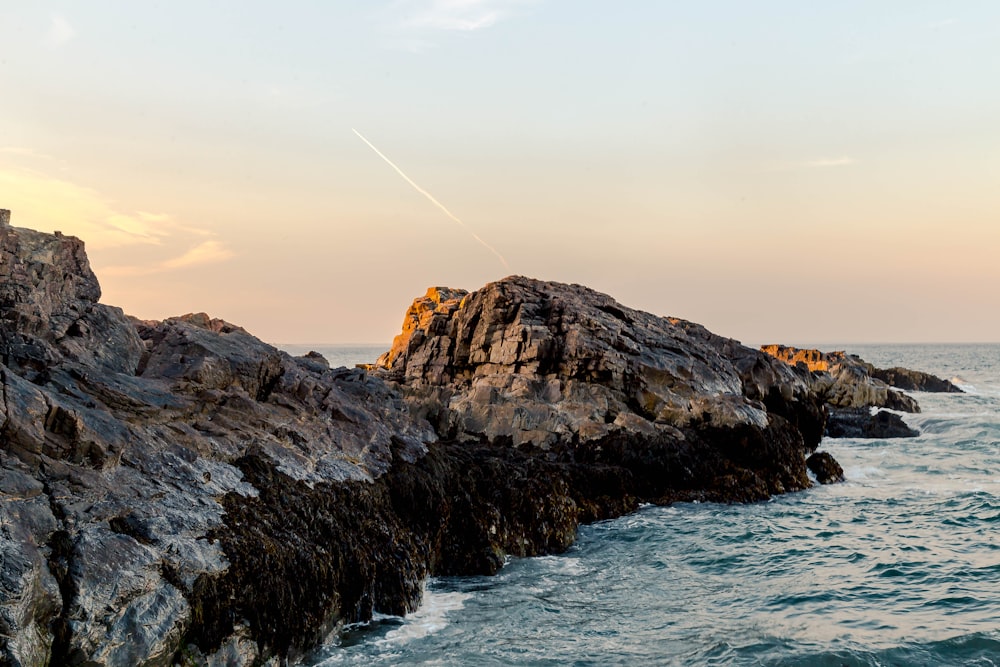 rock formation under clear sky during daytime