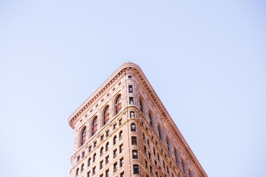 low-angle photo of concrete building,