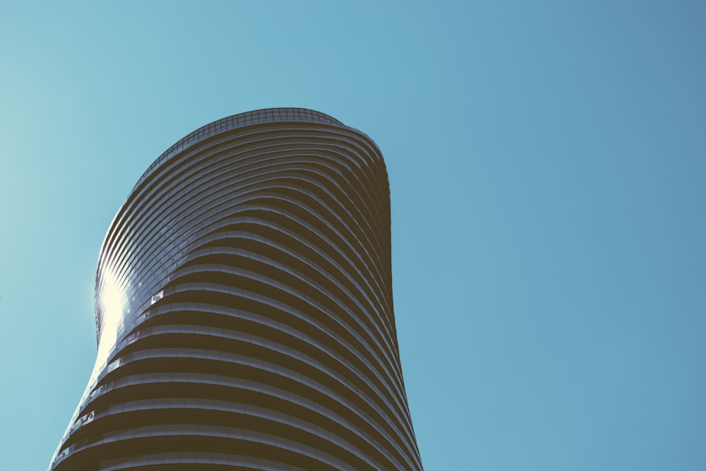 low angle photography of black high-rise building