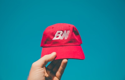 red fitted cap