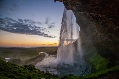 Sunset over the canyon with the 7-meter waterfall cascading in the background.