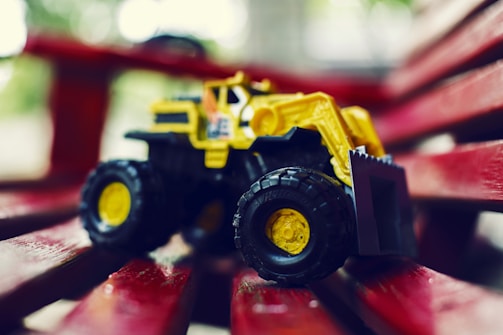 Close-up of a colorful, child-safe toy prototype on a designer's workbench.