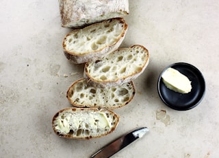 bread slices beside knife