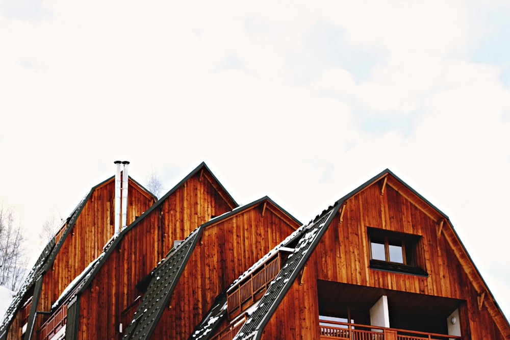 low angle photo of brown wooden house