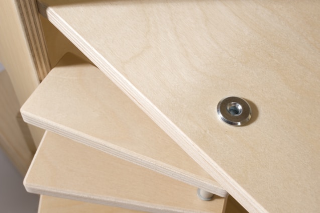 Close-up of detailed carpentry work on custom shelving