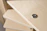 Close-up of wooden furniture assembled using high-quality wood screws.