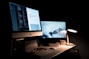 silver iMac turned on inside room