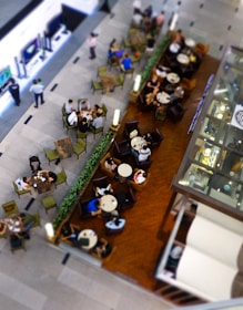 aerial view of people eating inside building during daytime
