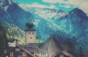 A vibrant Swiss village showcasing traditional architecture and lush greenery.