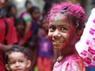 selective focus photo of girl in shirt smiling