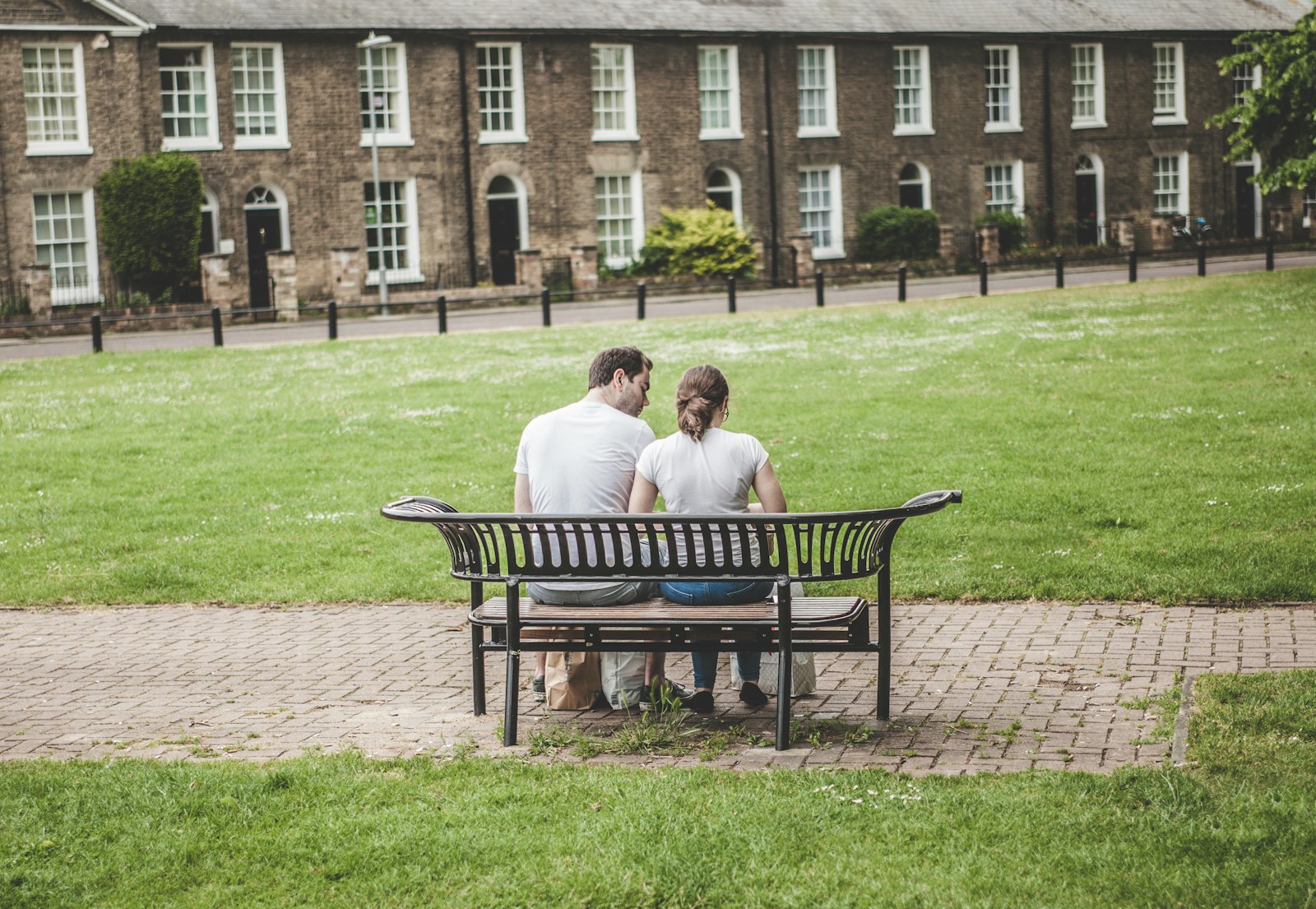 Canon EF 28-70mm f/2.8L USM sample photo. Man and woman sitting photography