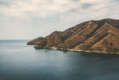 A serene landscape of the southern Chilean coast with cold winds sweeping over the sea.
