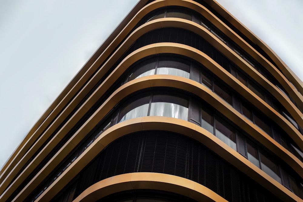 worm's eye view of brown glass building