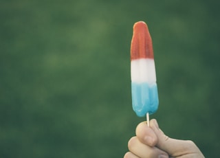 person holding ice pop